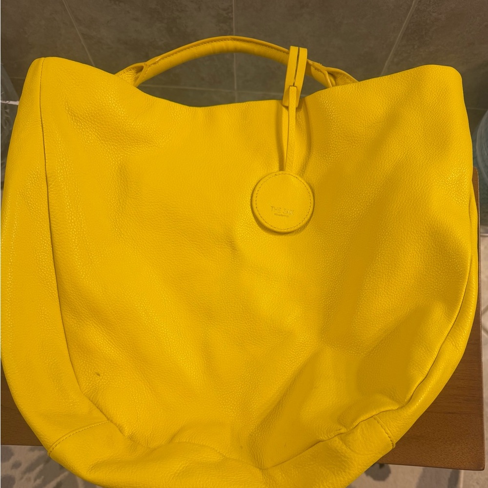 The Sak Vibrant Yellow with built in mirror and side gold zippers Tote Bag